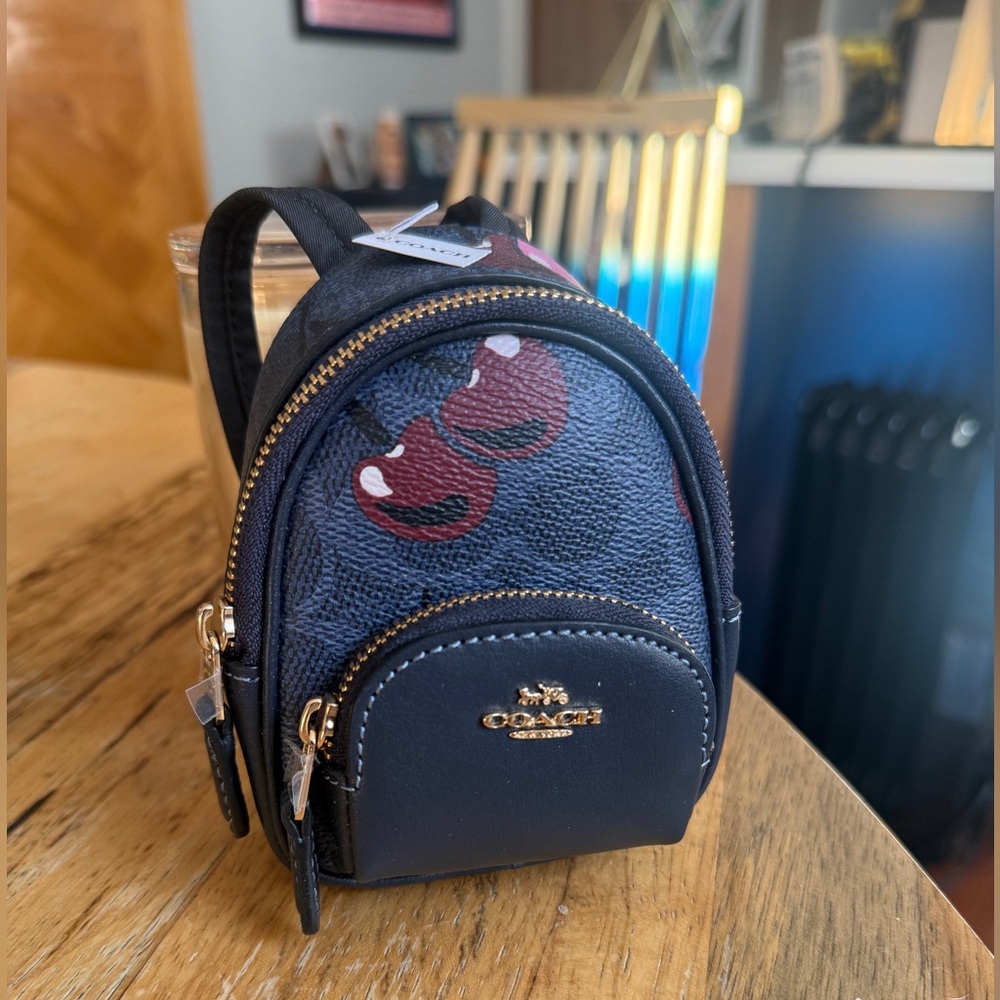 Coach Black Mini Backpack with Red Cherry Print